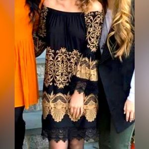 Black and gold off the shoulder dress